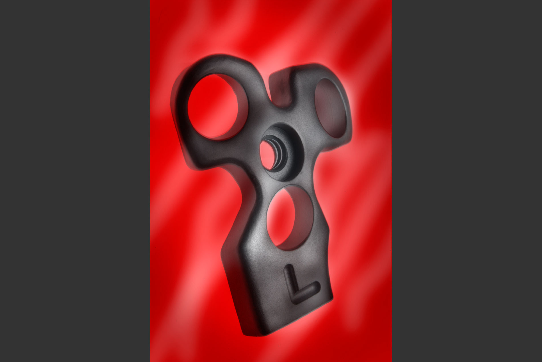 black machined parts catalog product photography